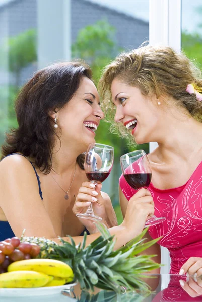 Portrait of two young attractive girls having good time — Stock Photo, Image