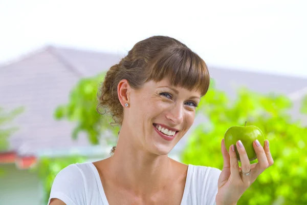 High key portrait of young woman in domestic environment — Stock Photo, Image