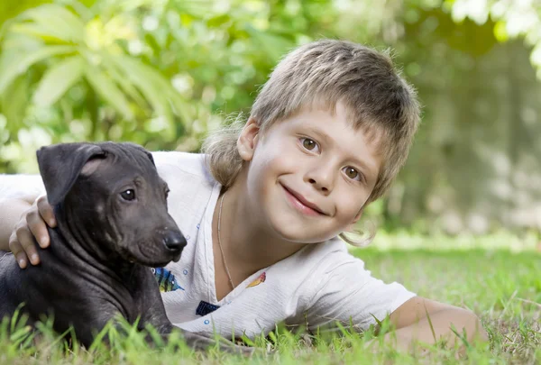 Portrait of little boy having good time in summer environment — Stock Photo, Image