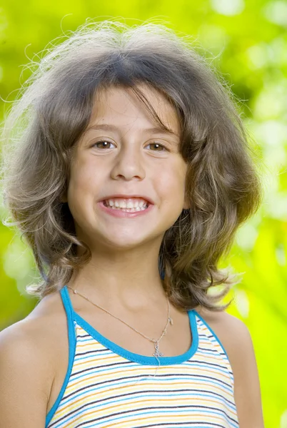 Portrait of little girl having good time in summer environment — Stock Photo, Image