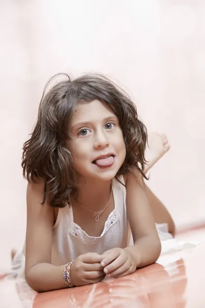 Studio portrait of nice little girl having good time — Stock Photo, Image