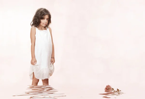 Studio portrait of nice little girl having good time — Stock Photo, Image