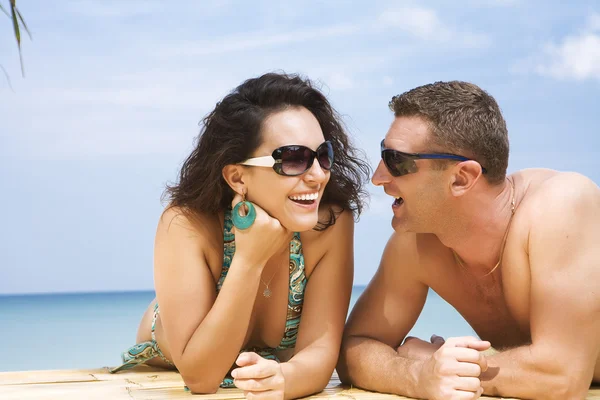 A portrait of attractive couple having fun in summer environment — Stock Photo, Image