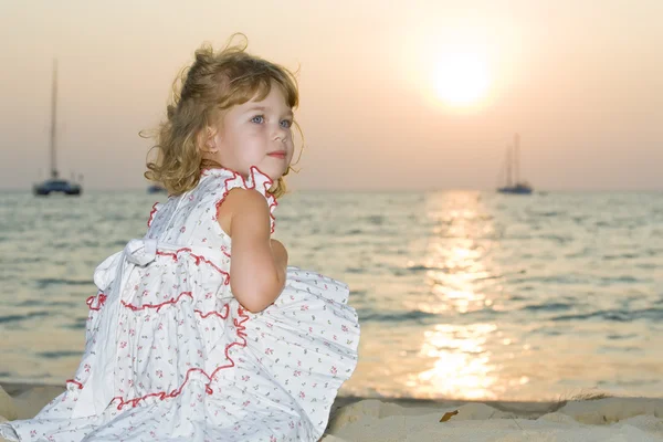 Portrait of little white girl having fun on the beach — Stock Photo, Image