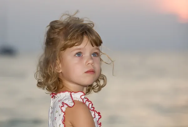 Portrait of little white girl having fun on the beach — Stock Photo, Image