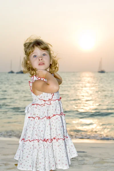 Portrait of nice little girl having fun on the beach — Stock Photo, Image