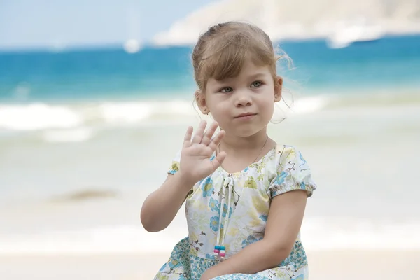 Portrait of nice little girl having fun on the beach — Stock Photo, Image