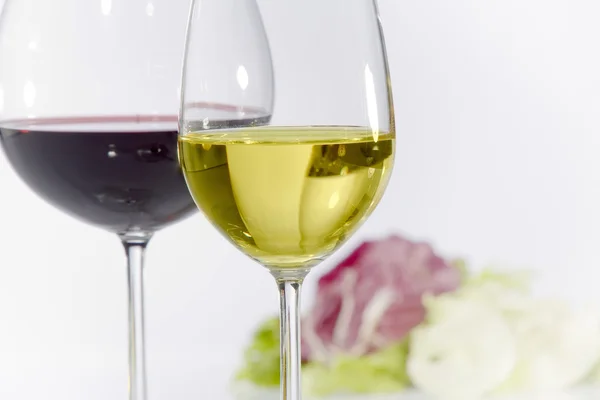 Close up view of two wine glasses filled with wine — Stock Photo, Image