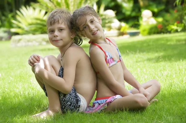 Portrait of little kids having good time in summer environment — Stock Photo, Image