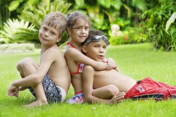 Portrait of little kids having good time in summer environment Stock Photo