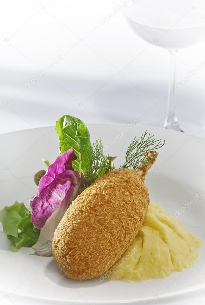 Close up view of nice delicious chicken Kiev on white back