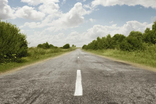 Panoramic view of nice summer empty road through the mountain — Stock Photo, Image