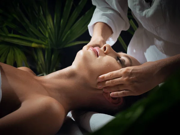 portrait of young beautiful woman in spa environment.