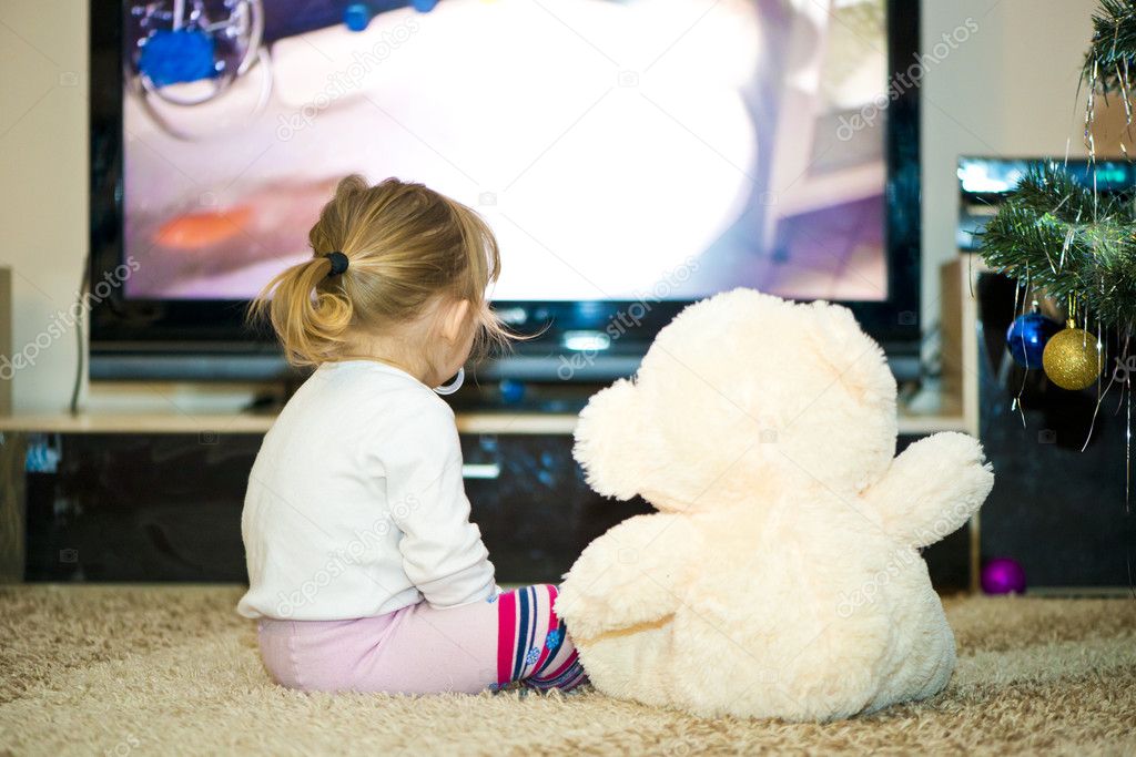 Baby watching television — Stock Photo © antos777 18408559