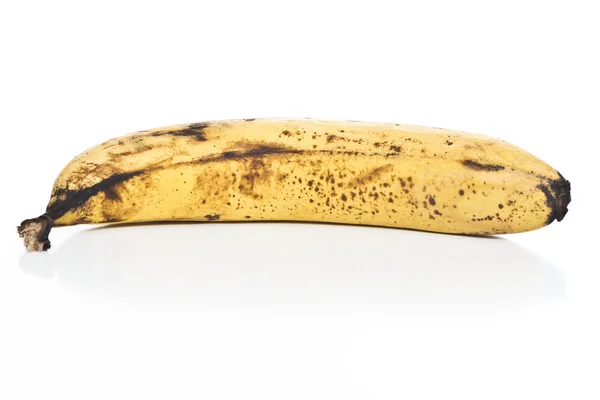 Rotten banana on white — Stock Photo, Image