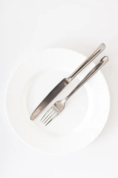 Cutlery and plate — Stock Photo, Image