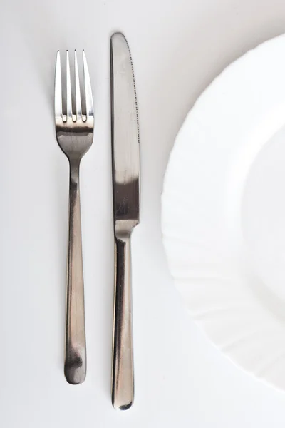 Cutlery and plate — Stock Photo, Image