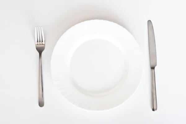Cutlery and plate — Stock Photo, Image