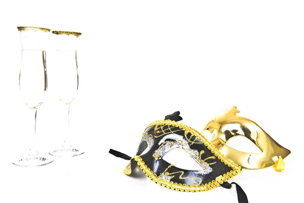 Two glasses of champagne and venetian mask — Stock Photo, Image