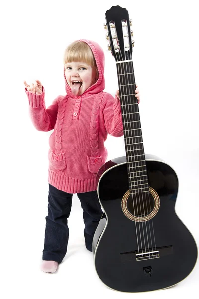 Little girl with a guitar — Stock Photo, Image