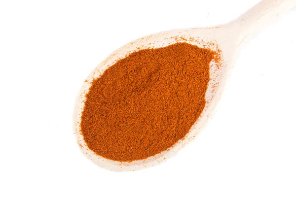Dry paprika on a spoon — Stock Photo, Image