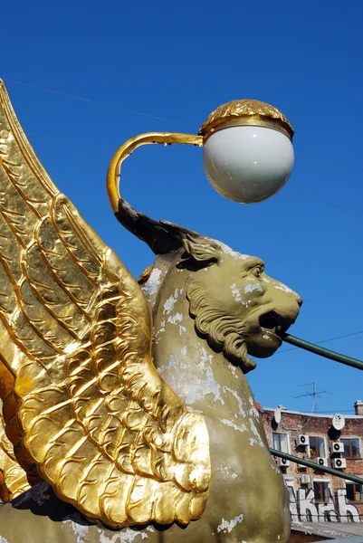 Griffin with golden wings — Stock Photo, Image