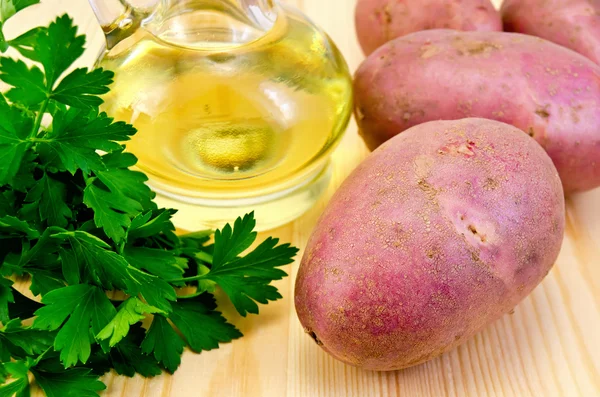 Potatoes red with parsley and oil — Stock Photo, Image