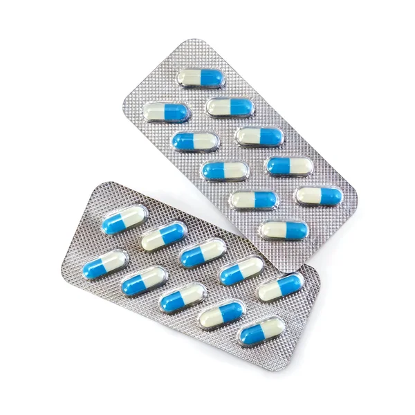 Capsules blue in two packs — Stock Photo, Image