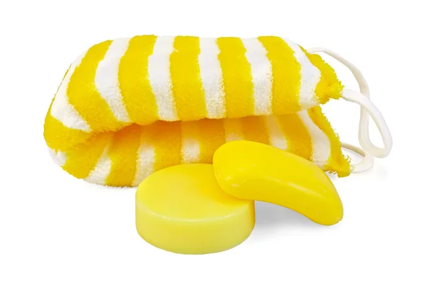 Sapone giallo con un panno — Foto Stock