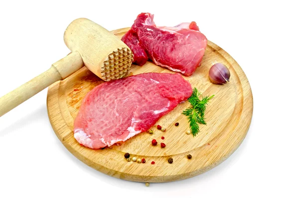 Meat repulsed with wooden mallet — Stock Photo, Image