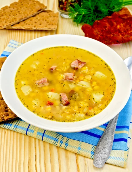 Soup pea with crispbreads on the plate — Stock Image Soup pea with crispbreads on the plate Stock Photo
