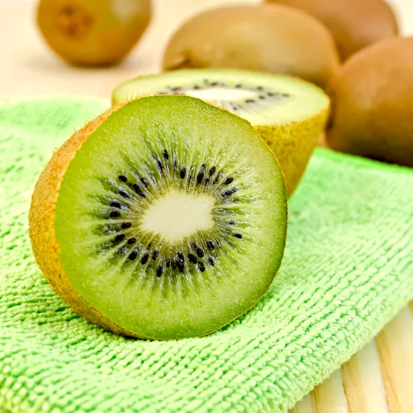 Kiwi on a green napkin — Stock Photo, Image