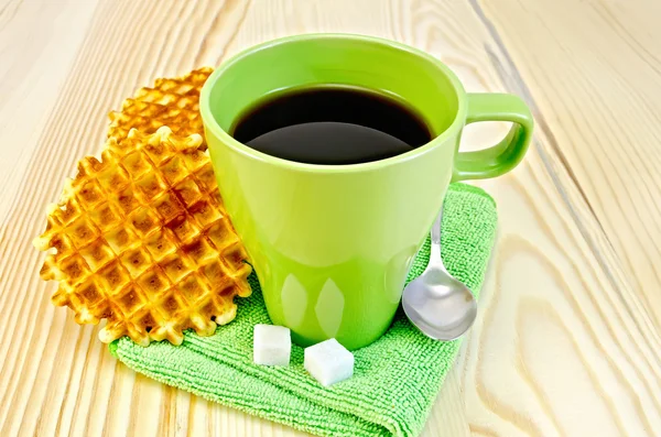 Wafers are round with a green mug and sugar — Stock Photo, Image