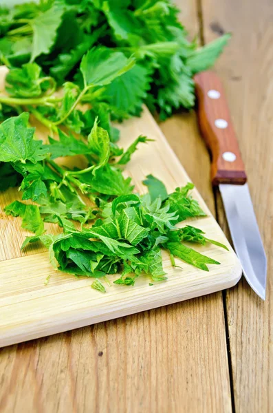 Nettle is incised on the board — Stock Photo, Image