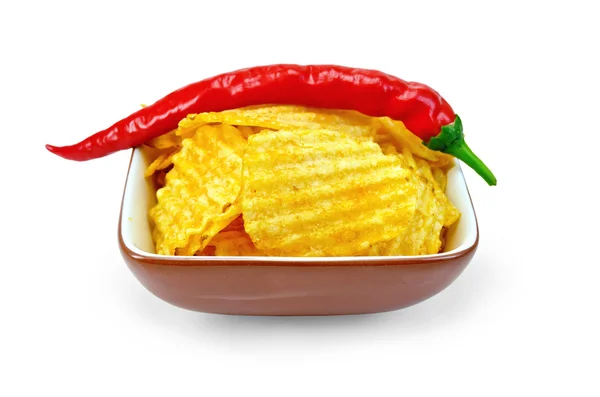 Chips in a bowl of hot peppers — Stock Photo, Image