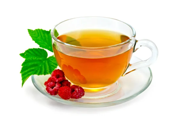 Tea with raspberries in a cup — Stock Photo, Image