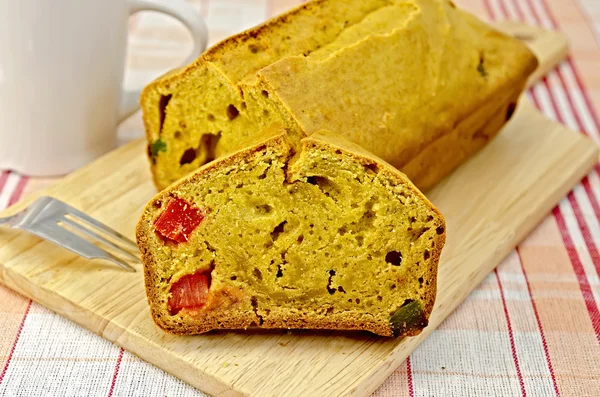 Fruitcake pumpkin with candied fruit on a napkin — Stock Photo, Image