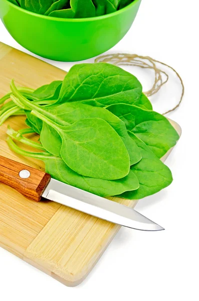 Spinaci sulla tavola con una ciotola — Foto Stock