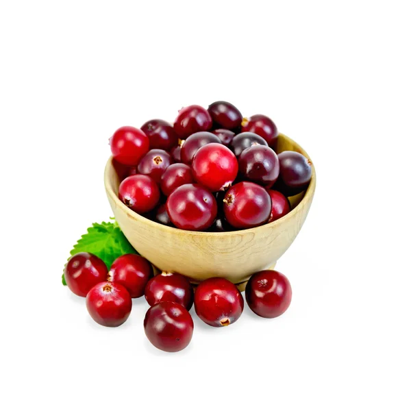 Cranberries in a wooden bowl — Stock Photo, Image