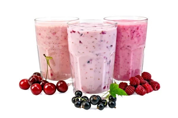 Milk shakes with berries in glass — Stock Photo, Image