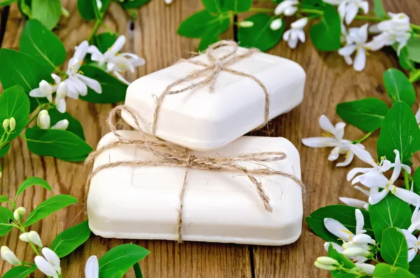 Soap white with flowers of honeysuckle — Stock Photo, Image