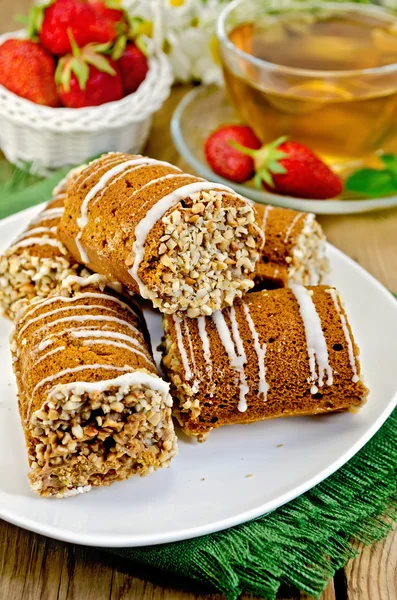 Cookies honey with strawberry and tea on board — Stock Photo, Image