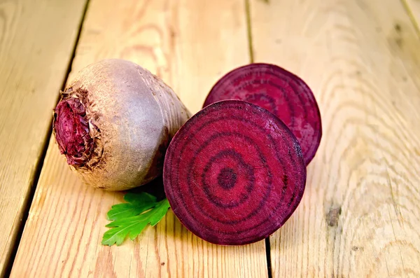 Beets with parsley on the board — Stock Photo, Image