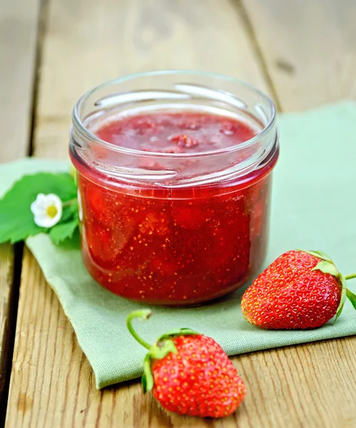 Jam of strawberry with berries on a board — Stock Photo, Image