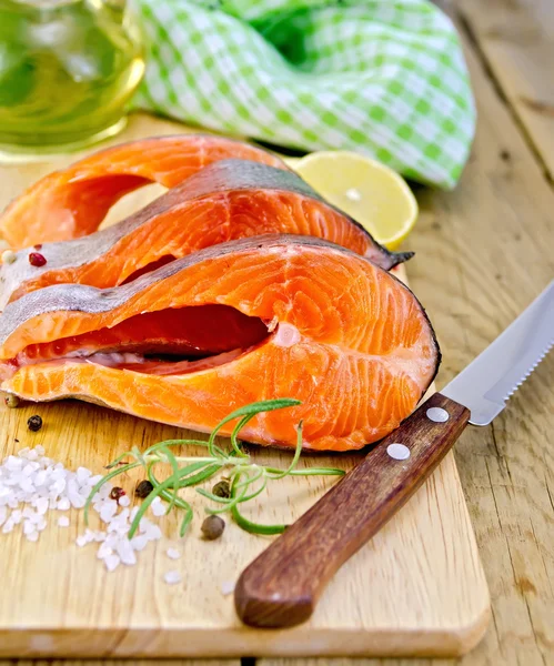 Trout with oil and knife on board — Stock Photo, Image