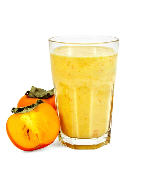 Milkshake with persimmons in a glass — Stock Photo, Image