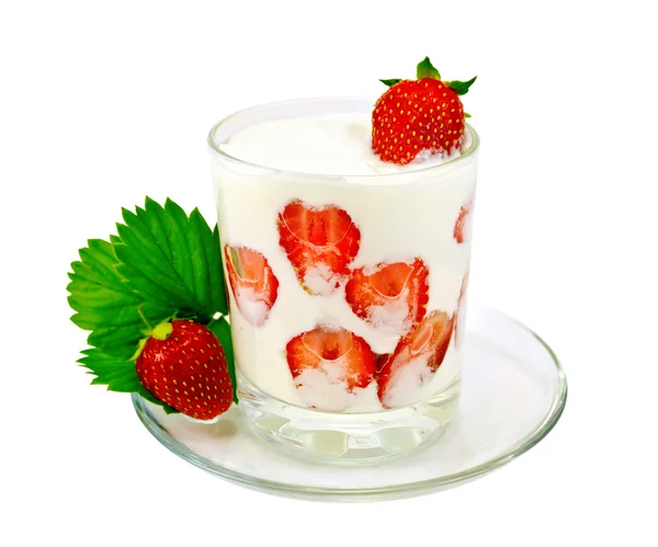 Yogurt thick with strawberries in glass on saucer — Stock Photo, Image