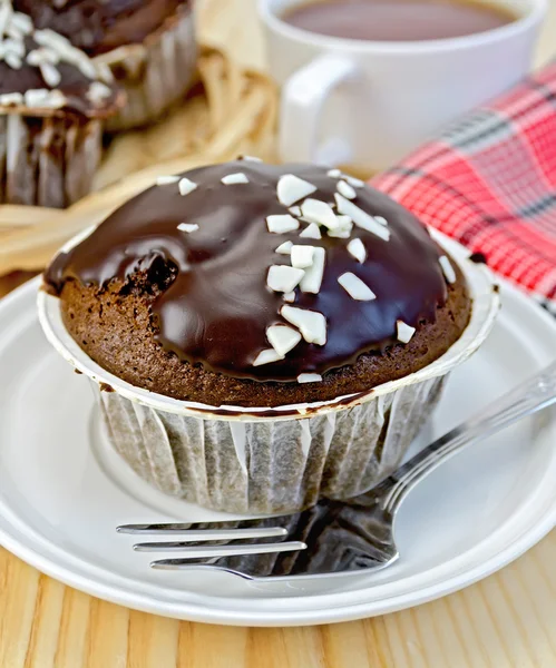 Cupcake chocolate with a red napkin — Stock Photo, Image