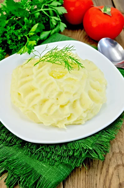 Puré de papas con mantequilla a bordo —  Fotos de Stock