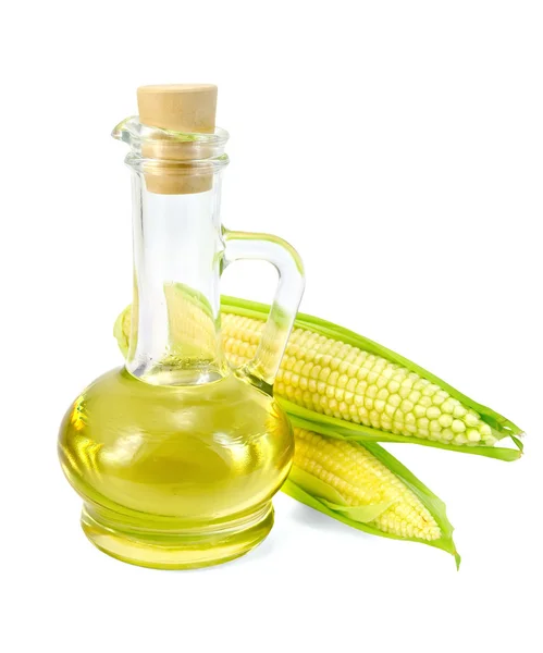Óleo de milho em uma garrafa com duas espigas — Fotografia de Stock